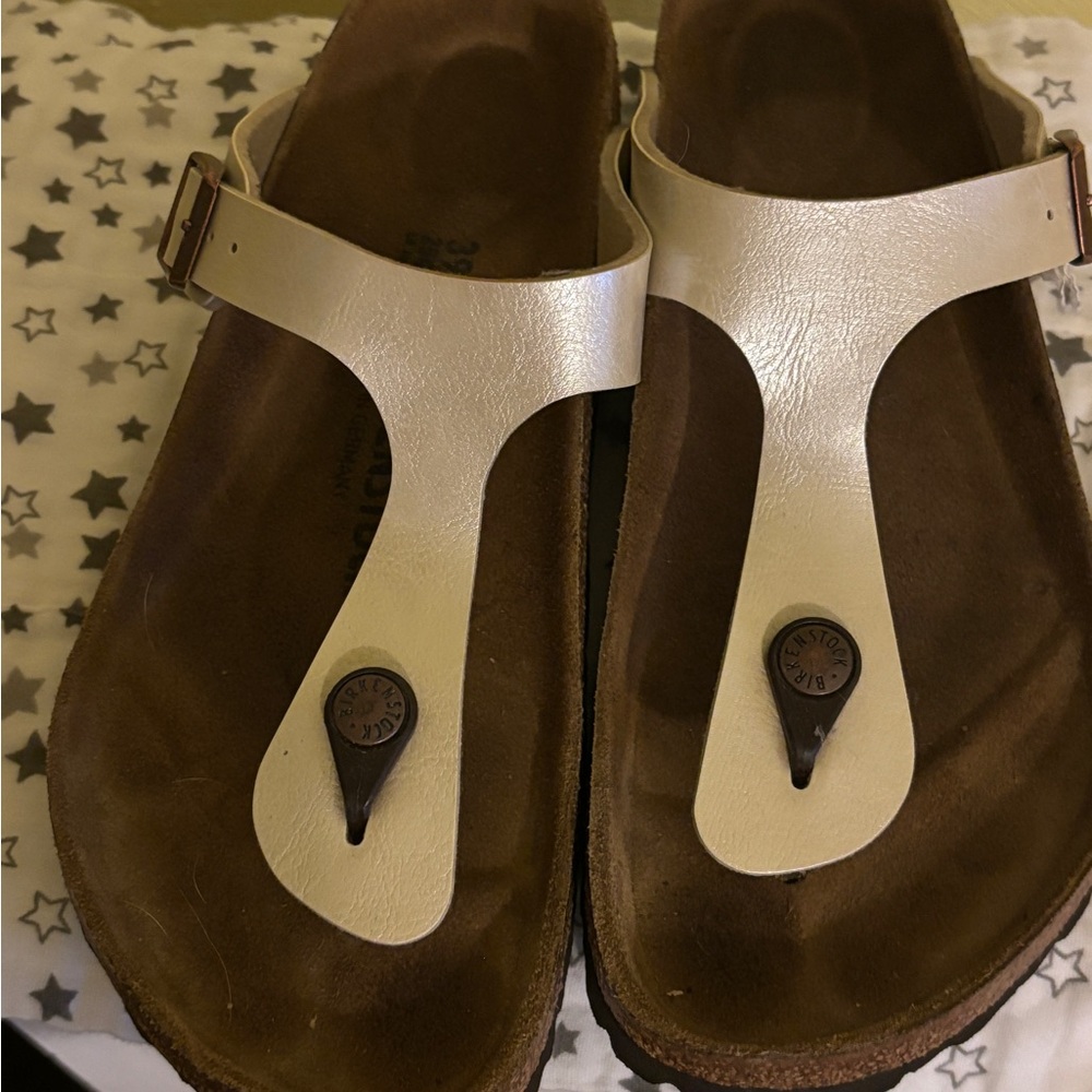 Birkenstock Women’s Cream T-Strap Sandals with Buckle